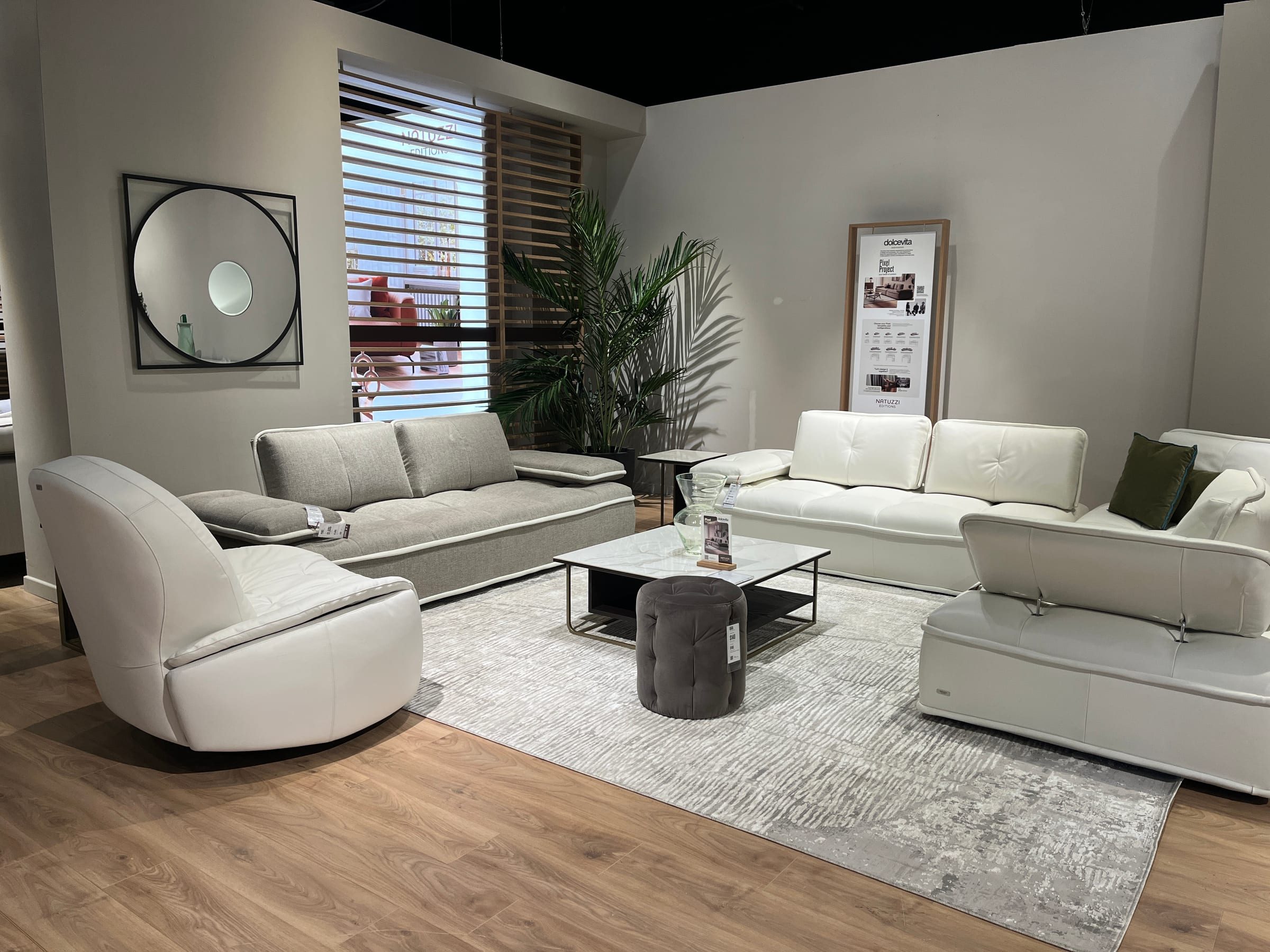 Wide view of the market showroom mid-appointment day.