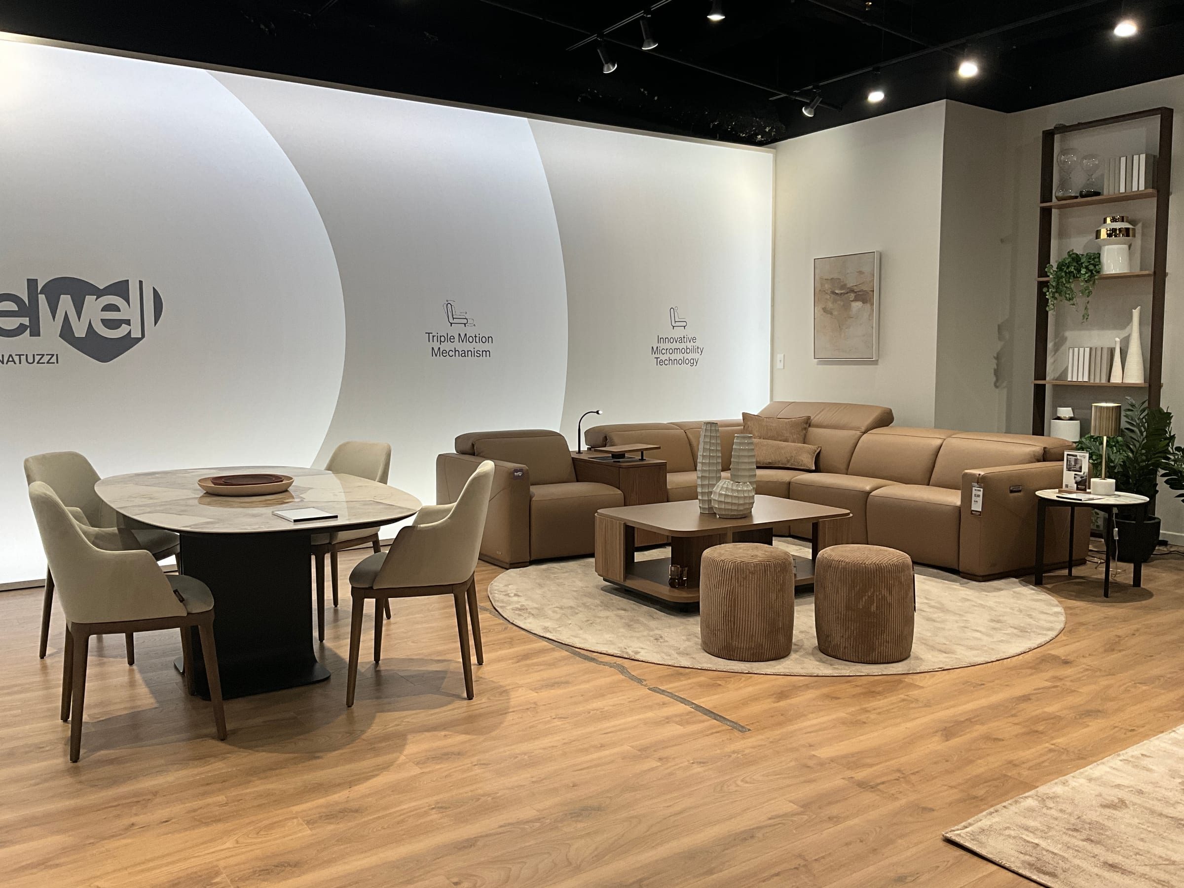 Motion upholstery grouping staged for buyer sell-in.