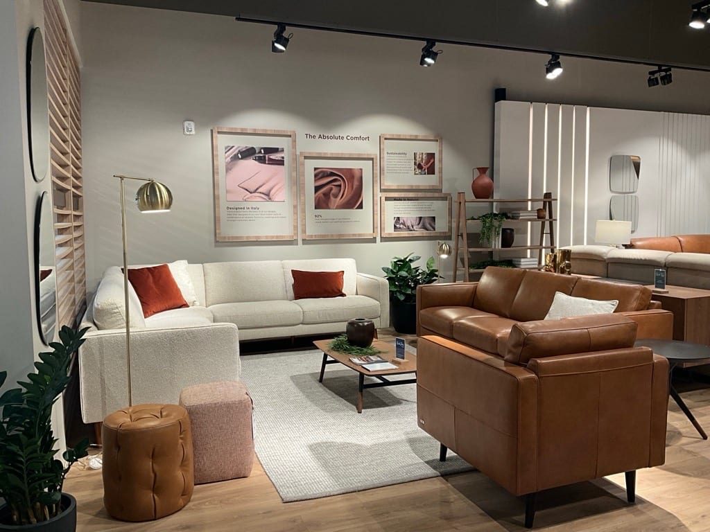 Primary hero upholstery group on the Southlake floor with rug, occasional tables, and lighting.